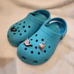 Teal crocs
